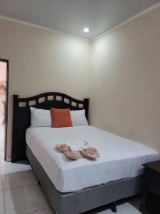 Cama o camas de una habitación en Spacious & Spotless new house, 4 BRs