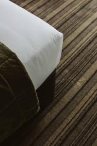 Posteľ alebo postele v izbe v ubytovaní The State Hotel