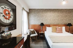 Posteľ alebo postele v izbe v ubytovaní The State Hotel