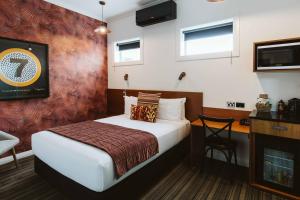 Posteľ alebo postele v izbe v ubytovaní The State Hotel