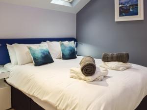 En eller flere senge i et værelse på Dundonald Landing - Palm 3 - Uk35430