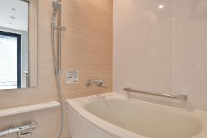 Ein Badezimmer in der Unterkunft REF Matsuyama City Station by VESSEL HOTELS