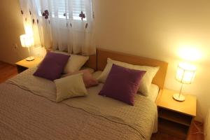 Posteľ alebo postele v izbe v ubytovaní Apartment Adriatic