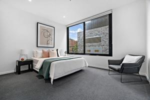 Postel nebo postele na pokoji v ubytování 11/7 White street