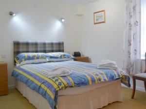 En eller flere senger på et rom på Seabreezes - Uk30690