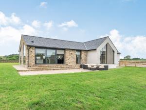 a house with a large grass field at Uk34190 - Gowan View in Arkholme