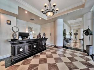 a lobby with a cash register in a building at King David Condominium Sunny Isles Beach in Miami Beach