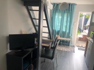 TV a/nebo společenská místnost v ubytování Appartement/studio