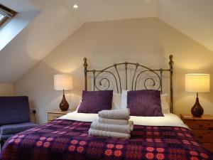 Ένα ή περισσότερα κρεβάτια σε δωμάτιο στο The Old Byre