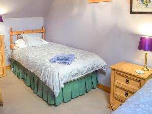 Ένα ή περισσότερα κρεβάτια σε δωμάτιο στο The Stables - Uk37415