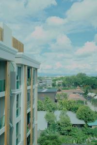 a view from the balcony of a building at Erawan condo in Chiang Mai