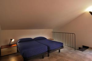 Postel nebo postele na pokoji v ubytování Residence i Cormorani