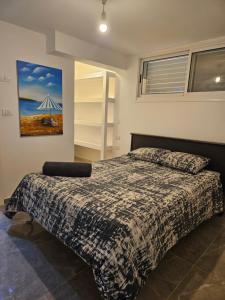 Katil atau katil-katil dalam bilik di Apartment with view on Dead Sea