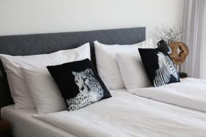 Postel nebo postele na pokoji v ubytování Al Pozz Boutique Resort