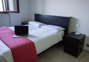 Postel nebo postele na pokoji v ubytování Wolf Apartment - Apartment in Langhe