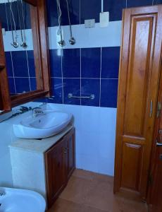 a bathroom with a sink and a toilet and a mirror at Sea View apartment in Dahab