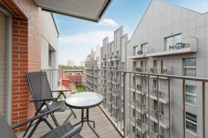 Balkón alebo terasa v ubytovaní Grano Residence - Pool, Sauna, SPA & Parking by Downtown Apartments + 37 fotografií