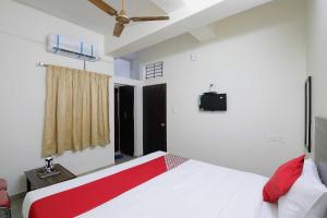 Voodi või voodid majutusasutuse Collection O Mathura Inn toas