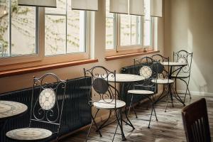 Khu vực ghế ngồi tại Hotel Calmo