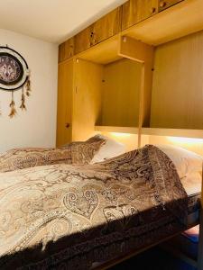 מיטה או מיטות בחדר ב-Haus Steghorn