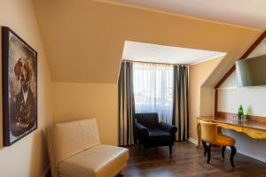 Khu vực ghế ngồi tại Hotel Calmo