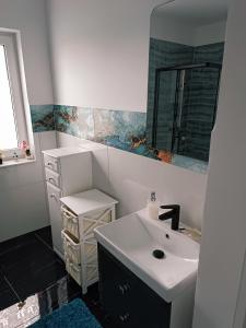 Kúpeľňa v ubytovaní Ostoja u Diany nad Zatoką
