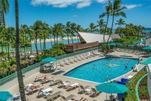 an aerial view of the pool at the resort at Ilikai Hotel with Ocean View in Honolulu
