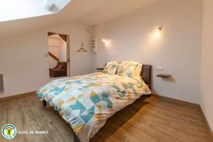 Ένα ή περισσότερα κρεβάτια σε δωμάτιο στο L'Appart de La Goutte d'Or