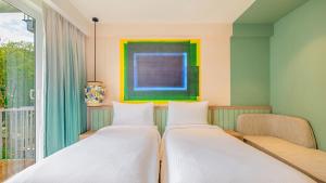 ibis Styles Goa Vagator - An Accor Brand客房内的一张或多张床位