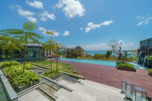 a view of a swimming pool in a building at Beyond The Sea - Luxe Sea View Villa in Jimbaran in Jimbaran
