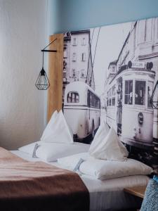 Posteľ alebo postele v izbe v ubytovaní Levy's Rooms & Breakfast + 37 fotografií