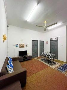 Χώρος καθιστικού στο D'inaa Homestay Kota Bharu