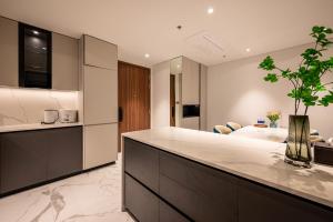 Mynd úr myndasafni af Metropole Condo City Central Sy's Home í Ho Chi Minh