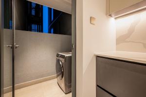 Mynd úr myndasafni af Metropole Condo City Central Sy's Home í Ho Chi Minh