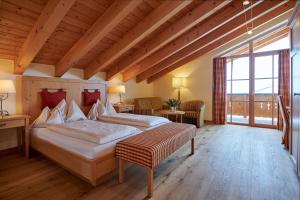 Posteľ alebo postele v izbe v ubytovaní Hotel Mohnenfluh