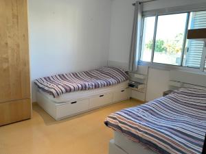 Postel nebo postele na pokoji v ubytování Ca n Aleix
