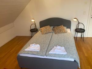 Postel nebo postele na pokoji v ubytování Le Onze Soixante Six Duplex très ensoleillé