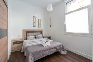 Ένα ή περισσότερα κρεβάτια σε δωμάτιο στο Basetxea apartment by People Rentals