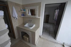 Ванная комната в Mountain Cottage Mons Baebius