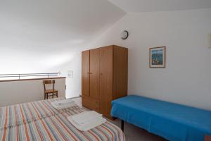 Postel nebo postele na pokoji v ubytování Lake View CORI Apartments