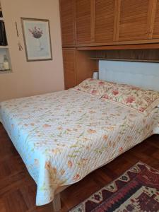 A bed or beds in a room at B&B La Dimora di Alida