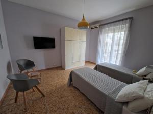 TV a/nebo společenská místnost v ubytování Alloggio Claudia - Valpo39