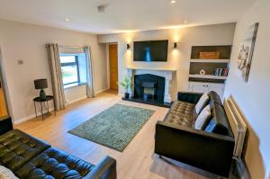 Et opholdsområde på Tyrella Cottage + 10 billeder