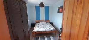 Posteľ alebo postele v izbe v ubytovaní Gyöngyvirág apartman delux
