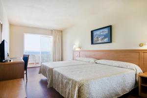 Postel nebo postele na pokoji v ubytování Hotel Best Mojácar