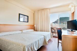 Postel nebo postele na pokoji v ubytování Hotel Best Mojácar