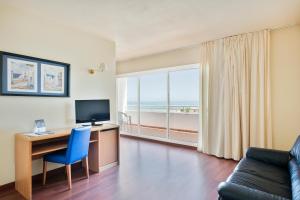 TV a/nebo společenská místnost v ubytování Hotel Best Mojácar