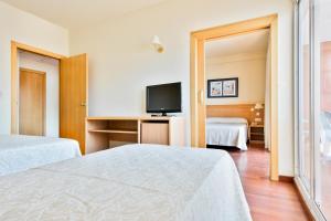 Postel nebo postele na pokoji v ubytování Hotel Best Mojácar