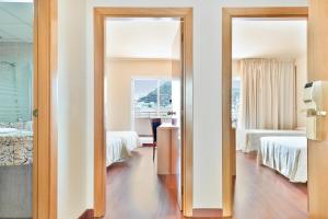 Postel nebo postele na pokoji v ubytování Hotel Best Mojácar