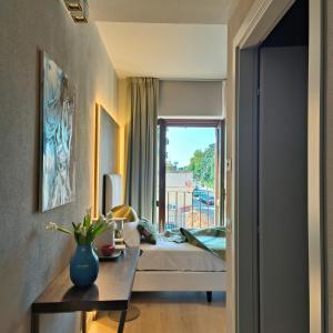 Postel nebo postele na pokoji v ubytování Hotel Battisti 31